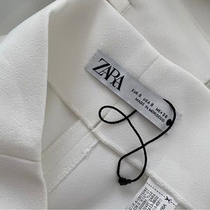 White high waisted trousers